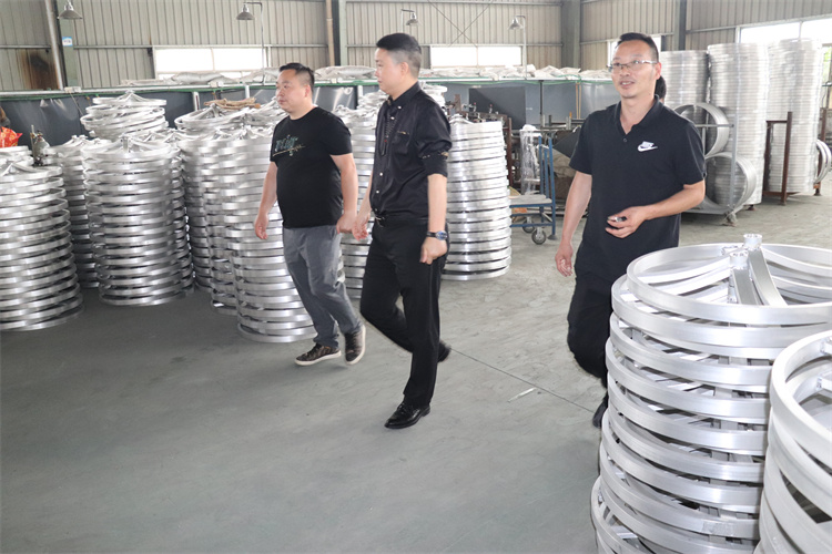 The boss inspected the furniture factory
